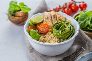 Fresh healthy salad in bowl and ingredients