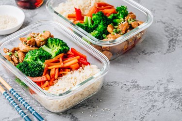 leftover chicken teriyaki meal prep lunch box containers with broccoli, rice and carrots