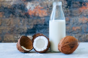 Whole coconuts and coconut products as milk and powder. White st