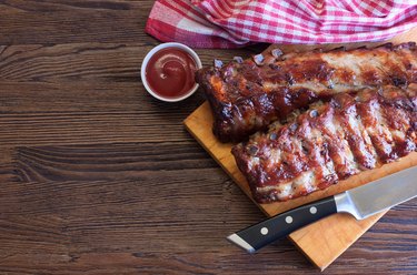 grilled pork ribs on a cutting board