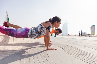 Fitness couple exercising outdoors