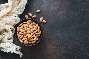 Raw almonds in bowl