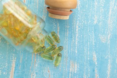 Top view of medicine bottles or vitamins