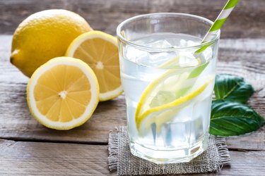 Glass of water with fresh lemon juice