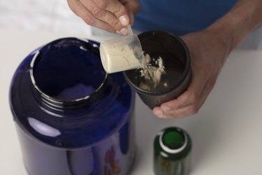 Organized shaker bottles in a wine rack and put protein powder in