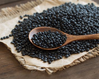 Black Lentils with a spoon