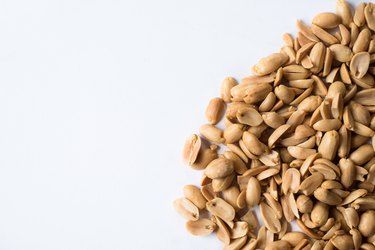 Directly Above Shot Of Peanuts On White Background