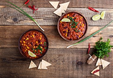 Chili con carne stew served in ceramic bowl