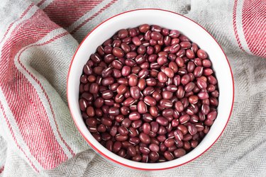 Directly Above Shot Of Adzuki Beans In Bowl On Napkin