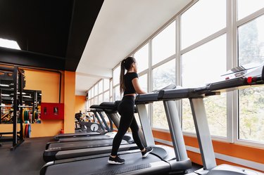 woman jogging on treadmill