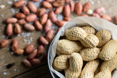 Salted peanuts on a paper bag