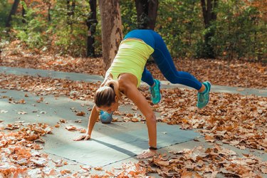 Woman Exercising Outdoors, High Intensity Interval Training.