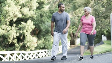 Couple Walking for Exercise Around Their Neighborhood