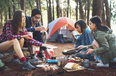 Friends camping in the forest