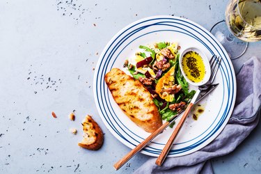 Salad - arugula (rucola), halloumi cheese, beetroot, walnuts and toast