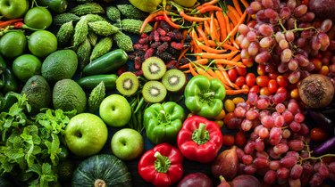Assortment of fruits and vegetables that can help to increase pH level in body