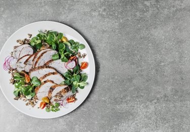 Roasted pork with lentils and fresh salad