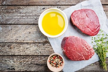 Raw marbled filet mignon steak