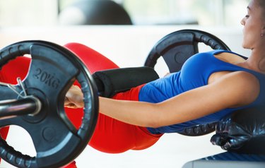 Woman performing hip thrust.