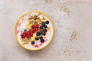 Granola with fresh fruits, chia and sesame seeds served in a bowl