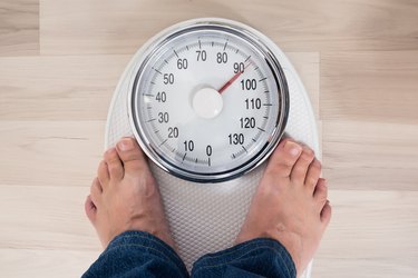 Person Standing On Weighing Scale