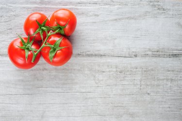 Directly Above Shot Of Cherry Tomatoes On Table