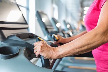 Senior woman workout on treadmill at gym