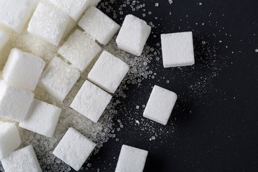 Background of sugar cubes. Top view