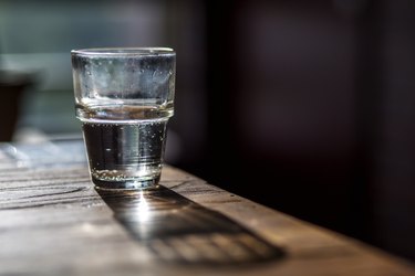 water glass on wooden table