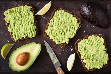 Avocado toast with whole-grain rye bread. Top view