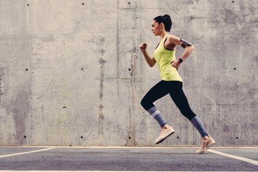 Young athlete jogging outside