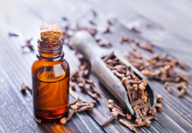 a small bottle of clove oil, as a toothache remedy