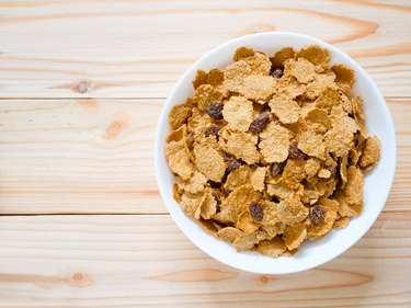 Cereal breakfast with raisin in white bowl