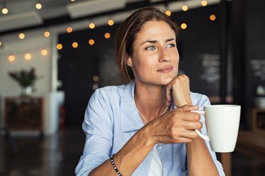 Woman drinking Mangosteen Tea