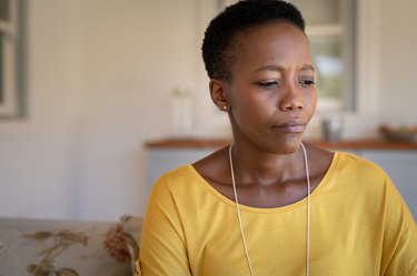 mature black woman alone at home