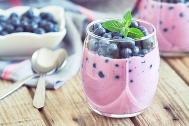 Blueberry yogurt served in glass