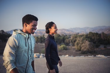 Couple enjoying a walk at dusk