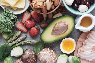 Top view of fruits and vegetables on a gray table