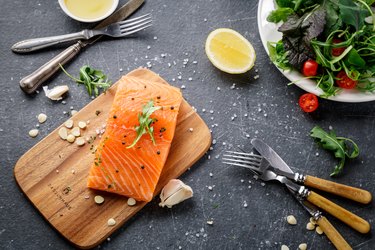 Raw salmon steak on the table