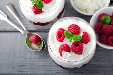 Healthy breakfast, desert, with chia seed pudding, cream, raspberry jam