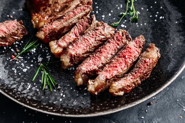 New York Striploin steak medium rare with rosemary top view