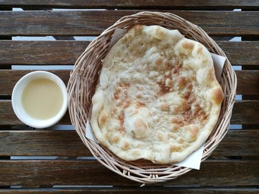 Directly Above Shot Of Roti In Basket On Table