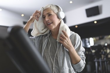 Senior woman exercising at the gym