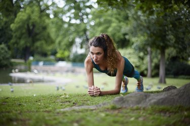 Active woman exercising in park