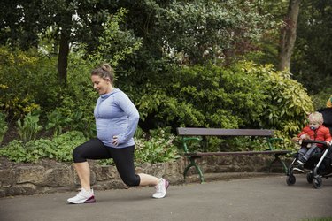 Woman doing lunges in the park
