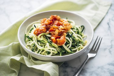 A bowl of fresh Zoodles with tomato sauce