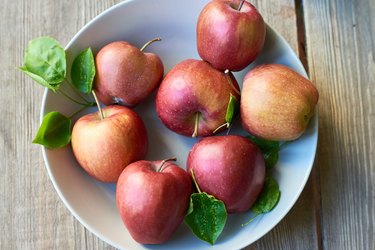 Fresh ripe apples in bowl