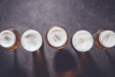 Beer glasses on dark table