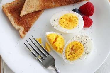 Hard boiled eggs with salt and pepper
