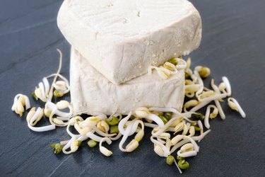 High Angle View Of Tofu And Sprouts On Table